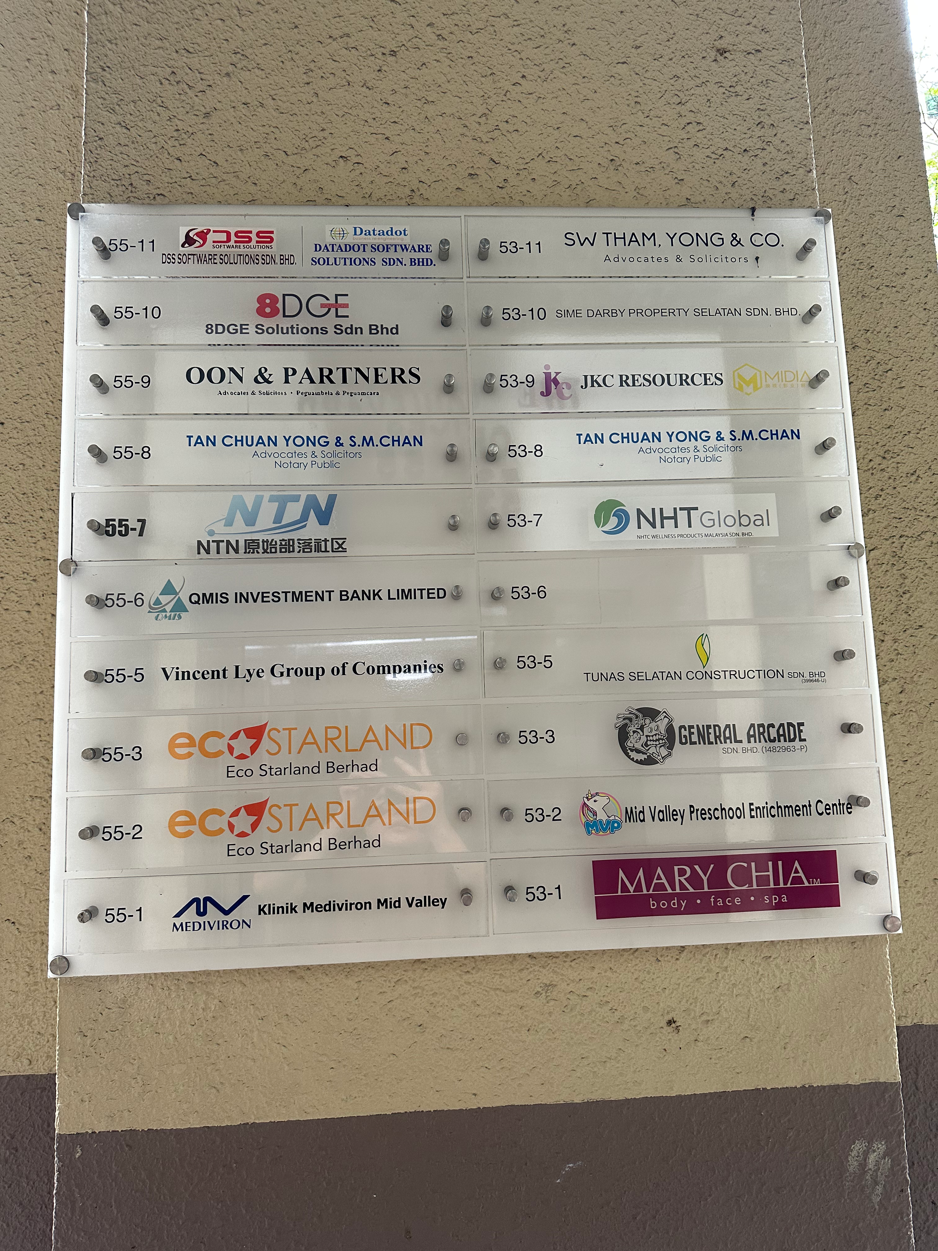 Building directory board listing SW Tham, Yong & Co. at Suite 53-11